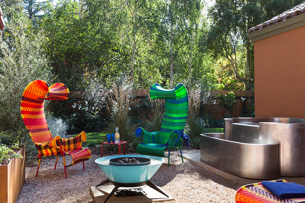 Stainless Steel Hot Tub with Integrated Water Feature and Catch Basin and Bench Seating. 87