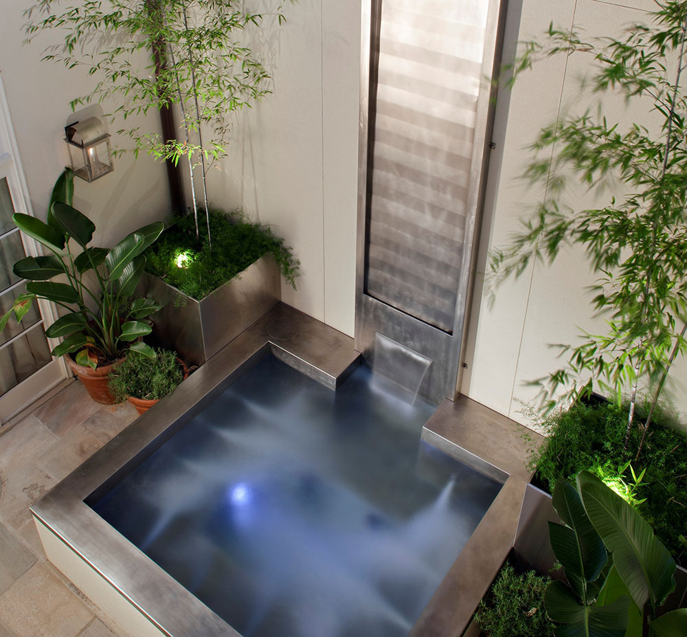 Hybrid Spa/Cold Plunge Pool with Stainless Steel Water Feature Spa dimensions: 98.5