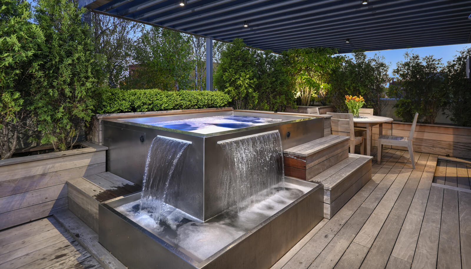 Stainless Steel Spa with Two Water Fall Features with Catch Basin, Bench Seating, LED lighting and Interior Stairs