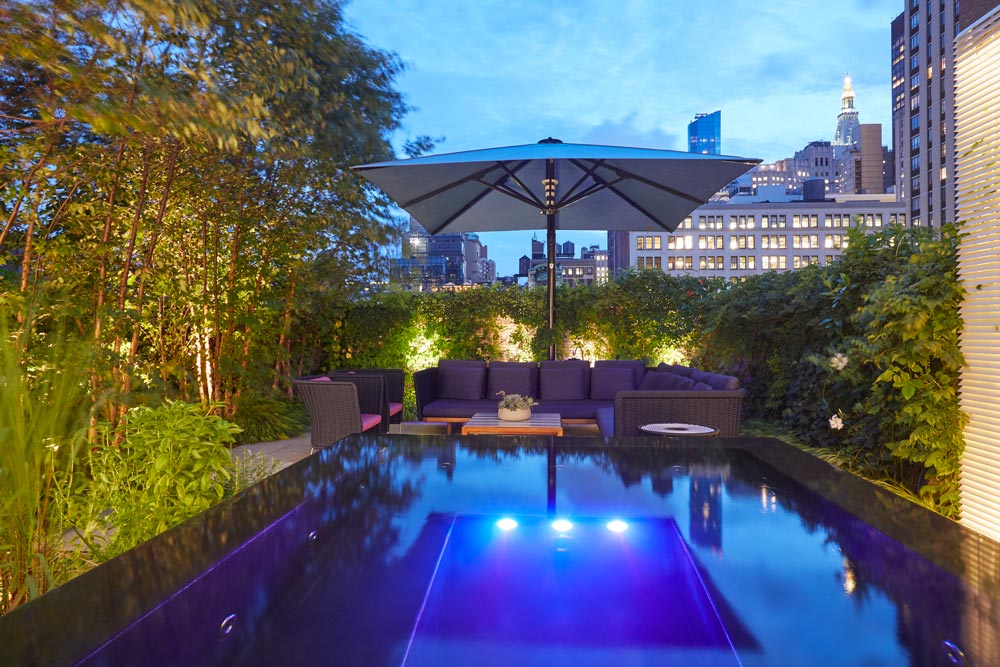 117”x98”x45” stainless steel rooftop spa with infinity edge and black onyx stone overlay