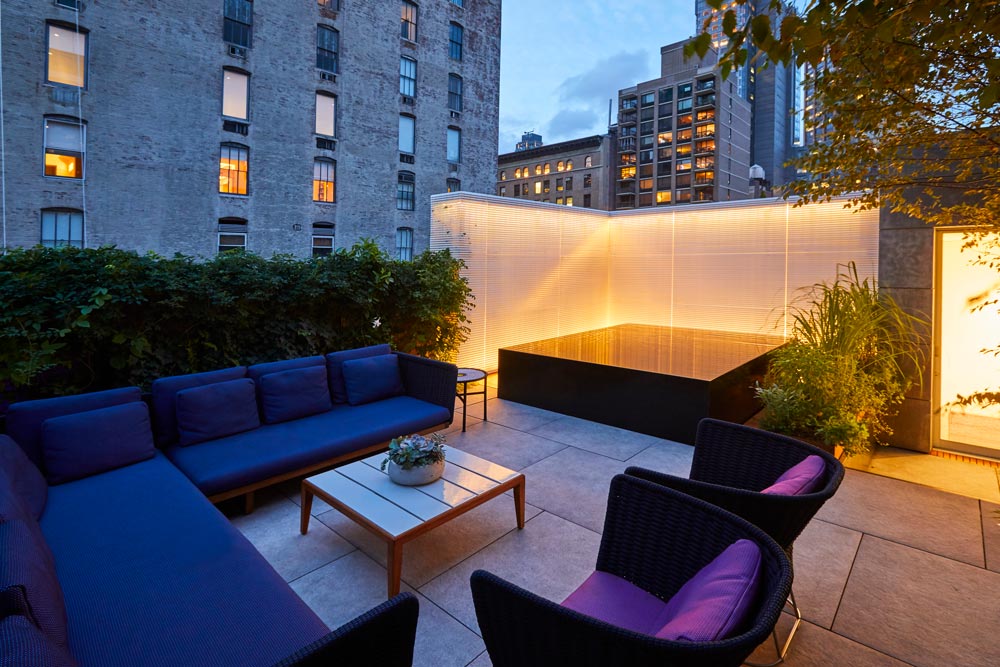 117”x98”x45” stainless steel rooftop spa with infinity edge and black onyx stone overlay