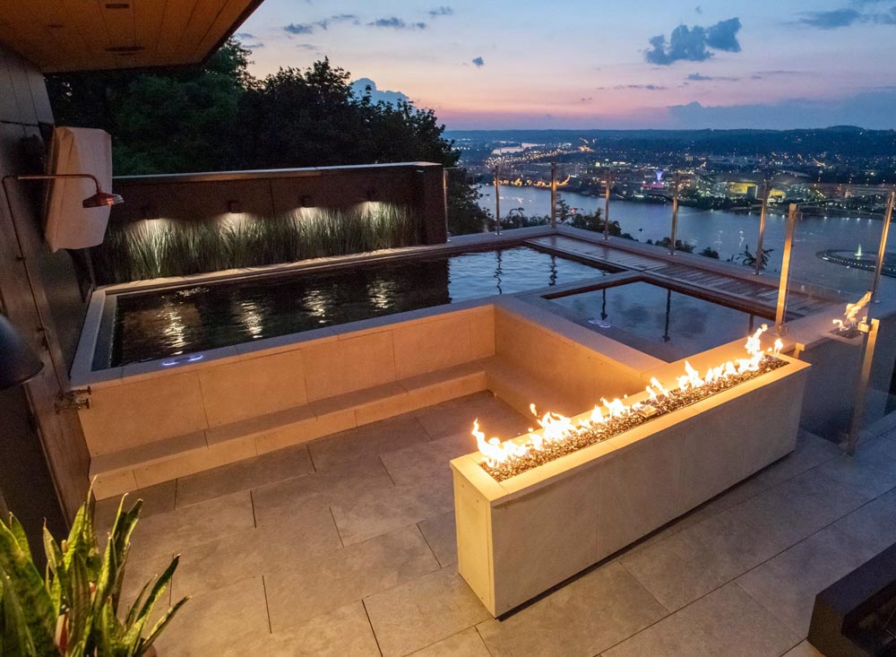 Copper rooftop pool with swim jet system, bench seating, LED lighting and neighboring copper spa. Pool 106