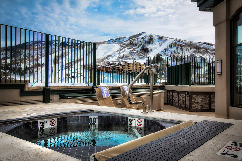 Sheraton Steamboat Resort and Villas. Stainless steel octagon spa with bench seating and auto cover 81”x83”x42”. Tile applied to spa walls and top ledge.