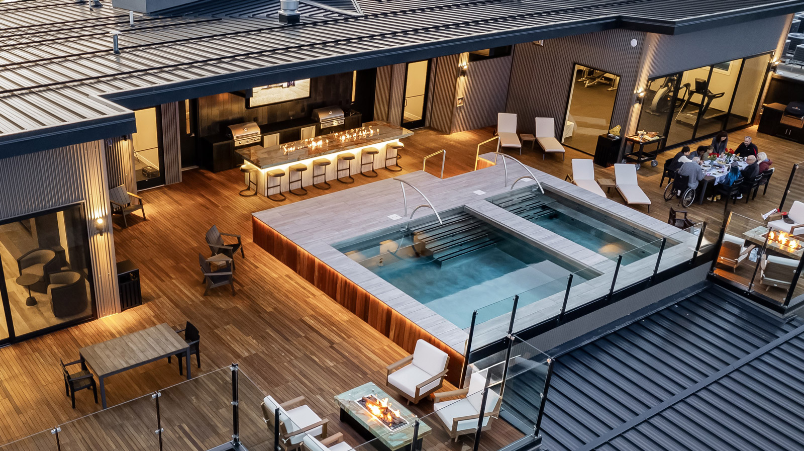 Rooftop stainless steel pool and spa with automatic cover and LED lighting.  Both pool and spa have interior descending stairways and bench seating.  179”x330”x48”